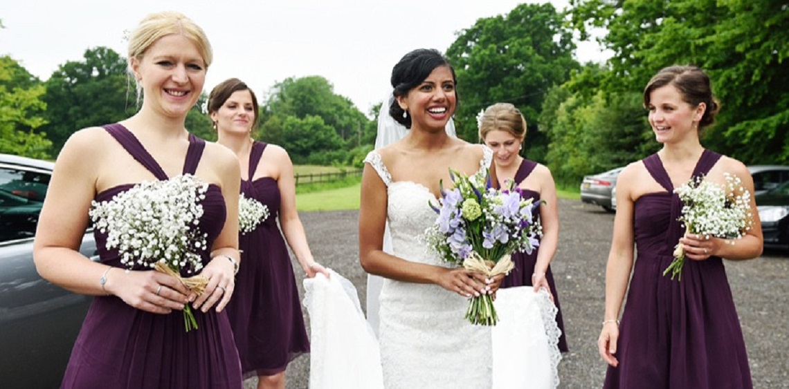 bride and bridesmaids at gildings barn