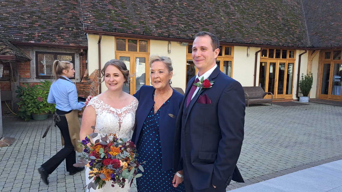 teona and happy couple at rivervale barn