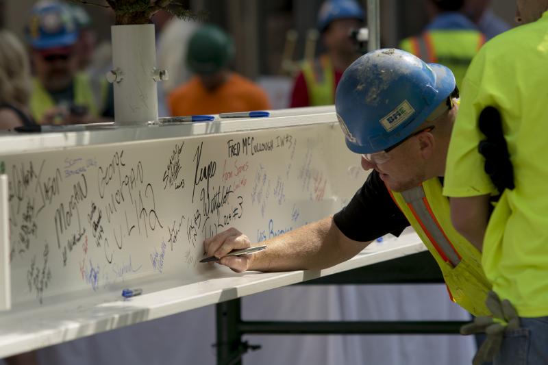 signing final girder